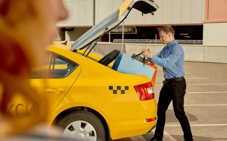 How can you easily book an out-of-town taxi from Indiranagar?